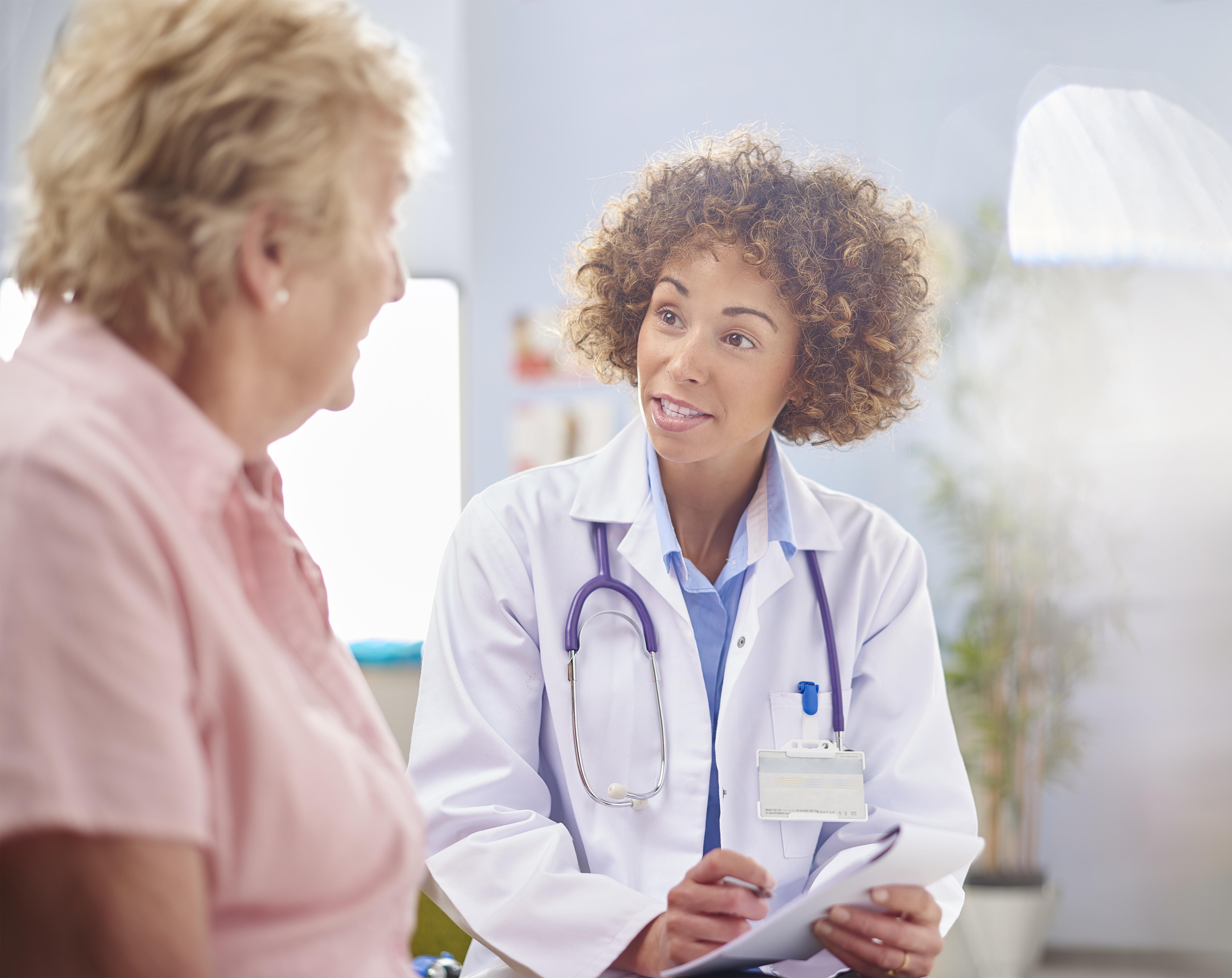 female doctor writing a prescription